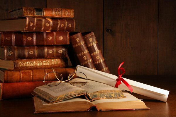 Old glasses lying on old books