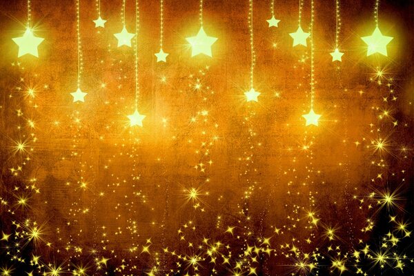 Étoiles de vacances jaune brillant sur fond brun. Décorations de Noël étoiles d or