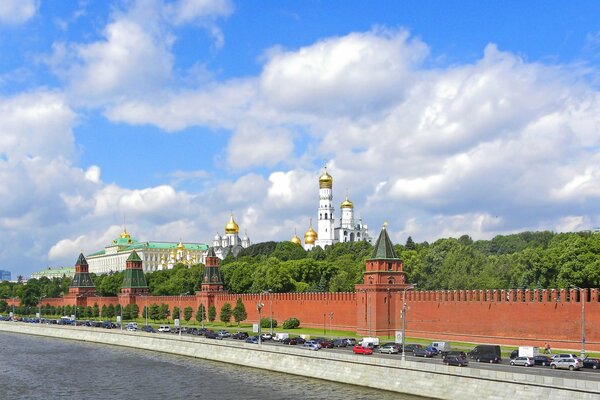 The sun paints the walls of the ancient Kremlin with bright light