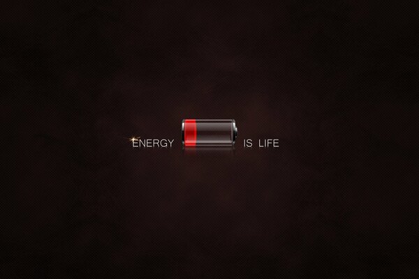 A battery on a creative background with the inscription energy is life