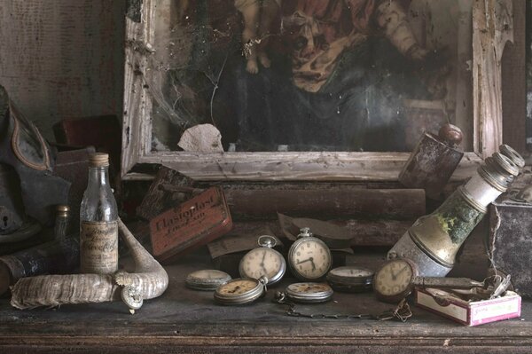 An old clock with bottles