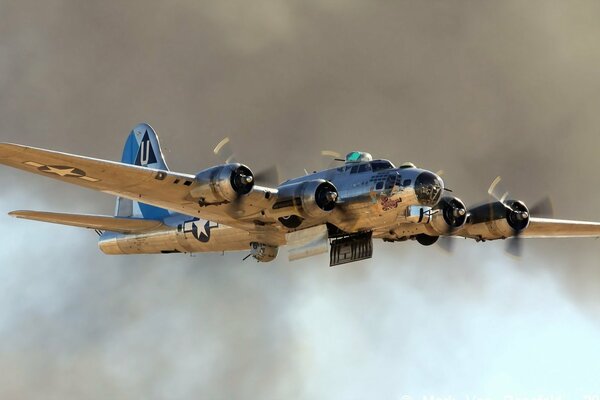 A golden-blue plane on a smoky background