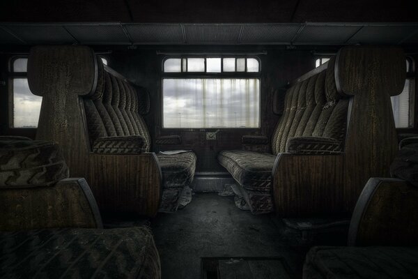 Chairs on the train dark photo