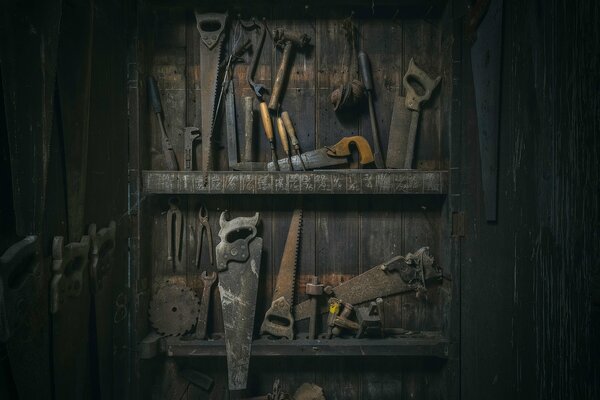 A large number of tools on the wall