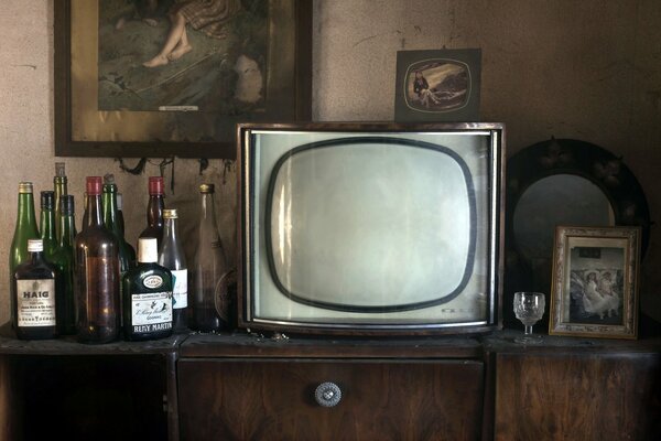 TV and bottles in the room