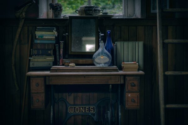 A table with books near the window