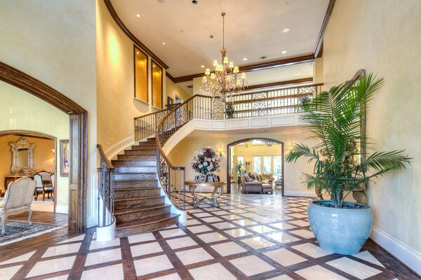 Wide corridor with stairs to the second floor