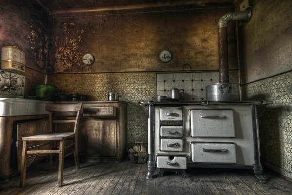 Interior of an old kitchen with an iron stove