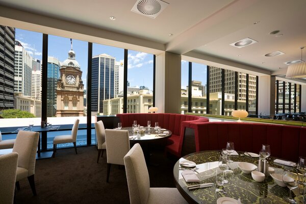 Restaurant with panoramic windows and city views