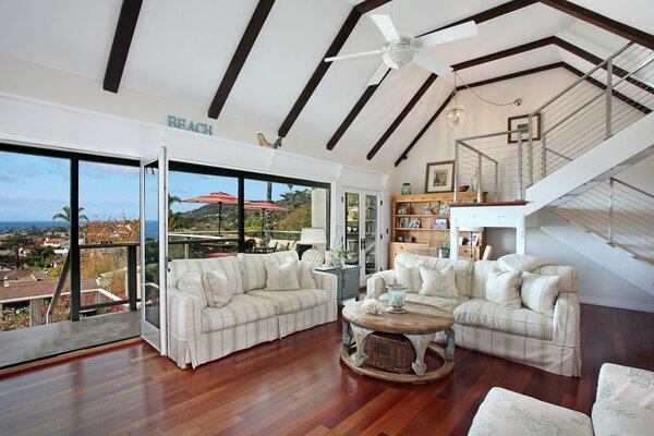 The interior of a modern living room with a window