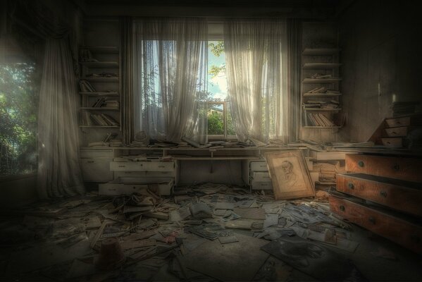 An untidy room with shelves of books