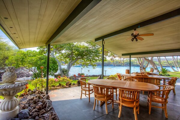 The veranda of the summer cafe on the background of the ocean