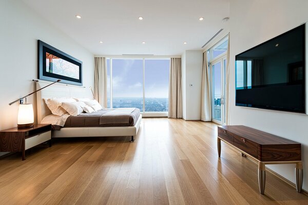 Intérieur minimaliste de la chambre avec vue sur la mer