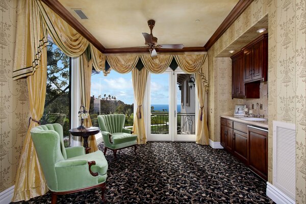 Photo of the living room interior:armchair, designer curtains