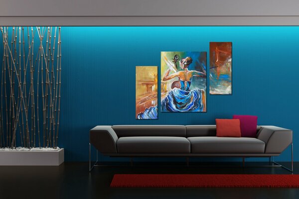 Sofa on the background of a painting and a bluish background