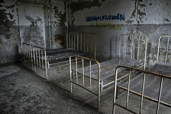 Old beds in an abandoned room