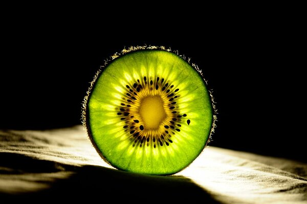 Grüne Kiwifruchtscheibe