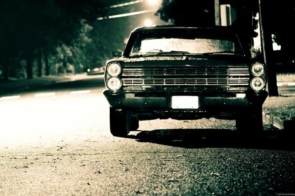 Antique car on the night road