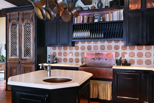 Kitchen with sink in the center of the room