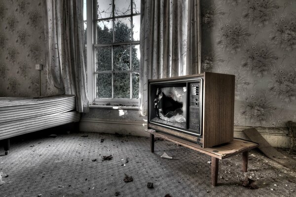 A broken old TV in the room