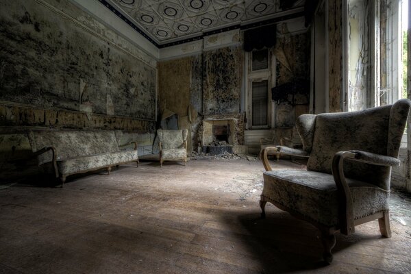 Living room in an abandoned house with a cinema