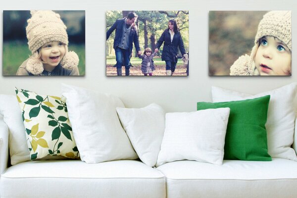 Family photo on the wall above the sofa