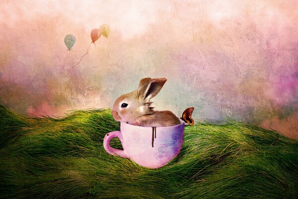 A little rabbit is sitting in a mug