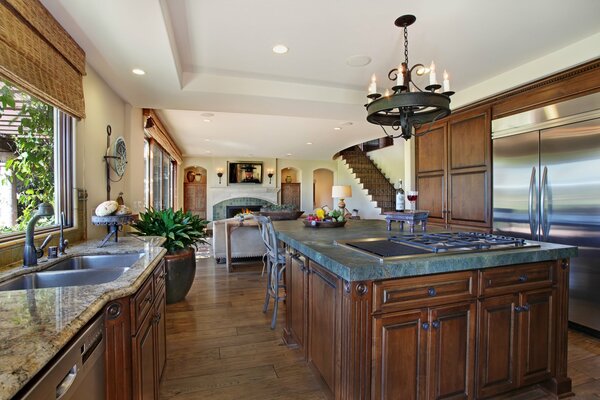 Large kitchen and dining room with chandelier