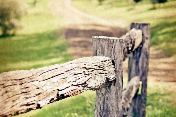 Wooden fence and road. Style