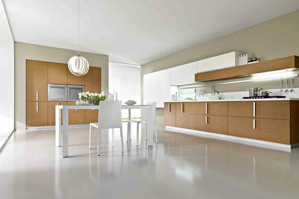 Es una sala de cocina con un diseño interior elegante como en una Villa