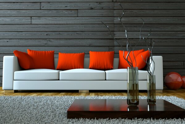 Stilvolles Wohnzimmer mit weißem Sofa. rote Kissen und mit Holz verkleidete Wände