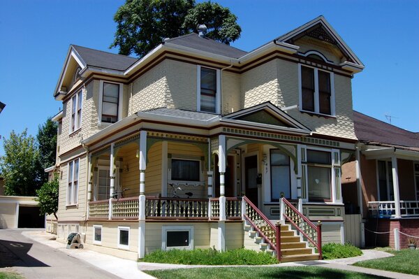 Two-storey country house with a porch