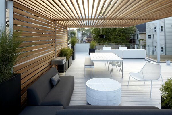 Stylish courtyard with white furniture