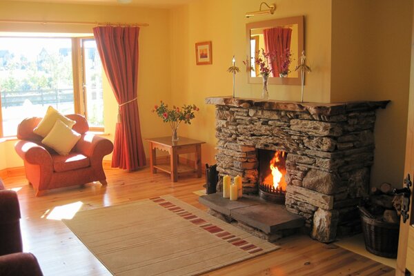 Cozy atmosphere in a bright room with a fireplace