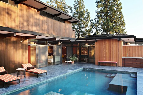 Stylish pool at the house with sun beds