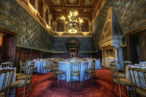 An old-style room with decorated tables