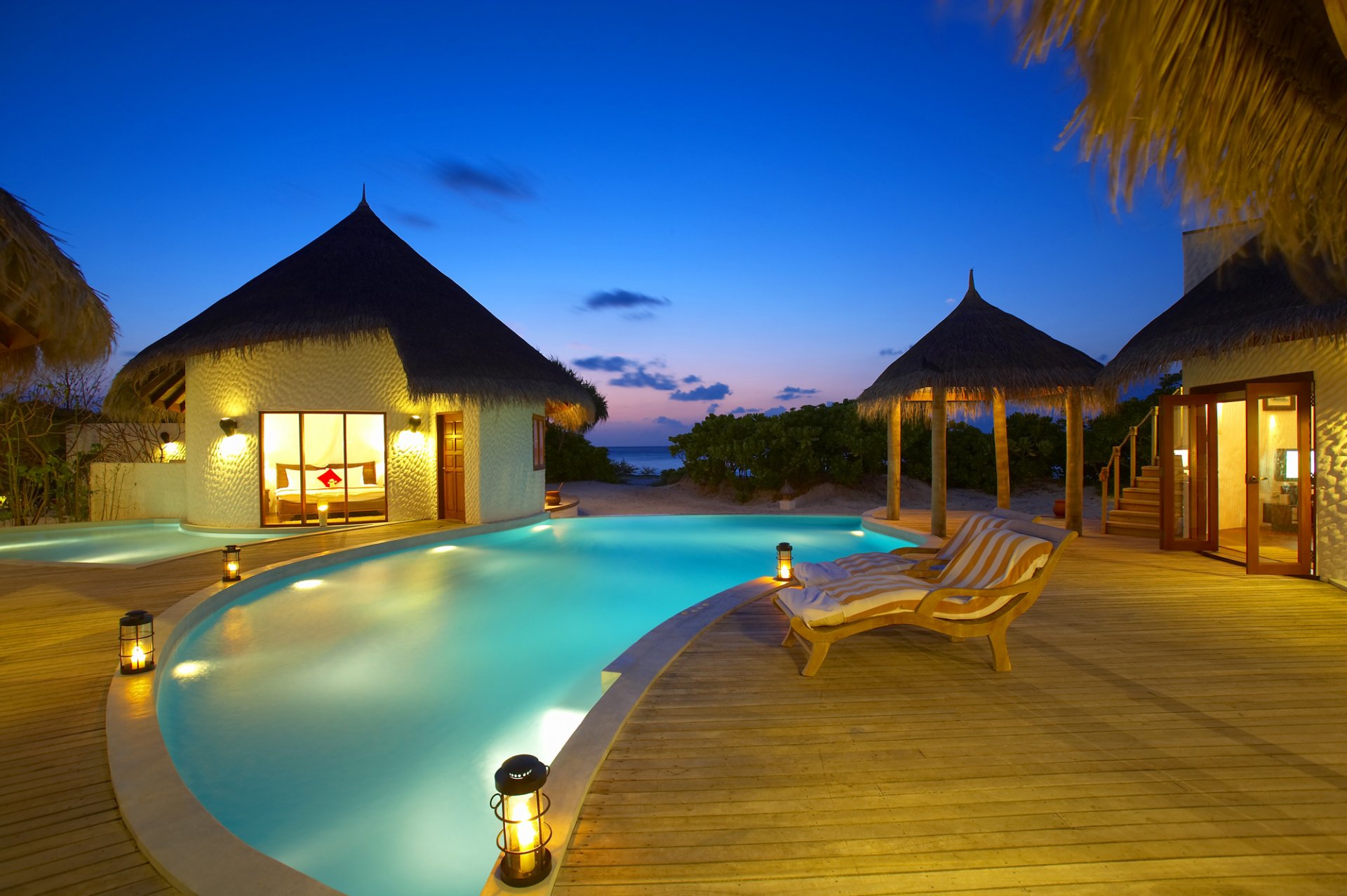 the maldives night pool houses bed beds sea sand