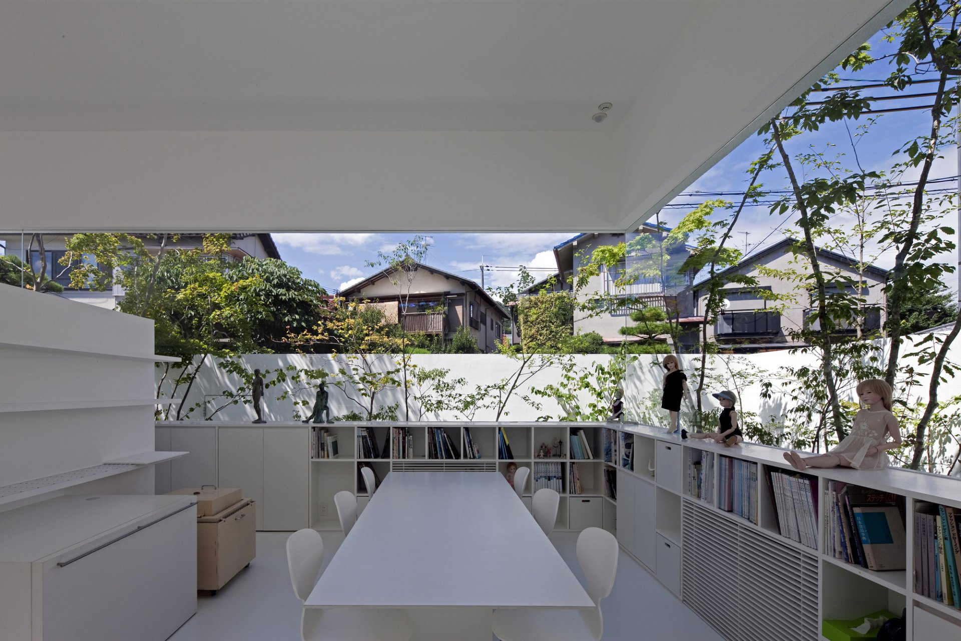 white interior books shelf solid glazing