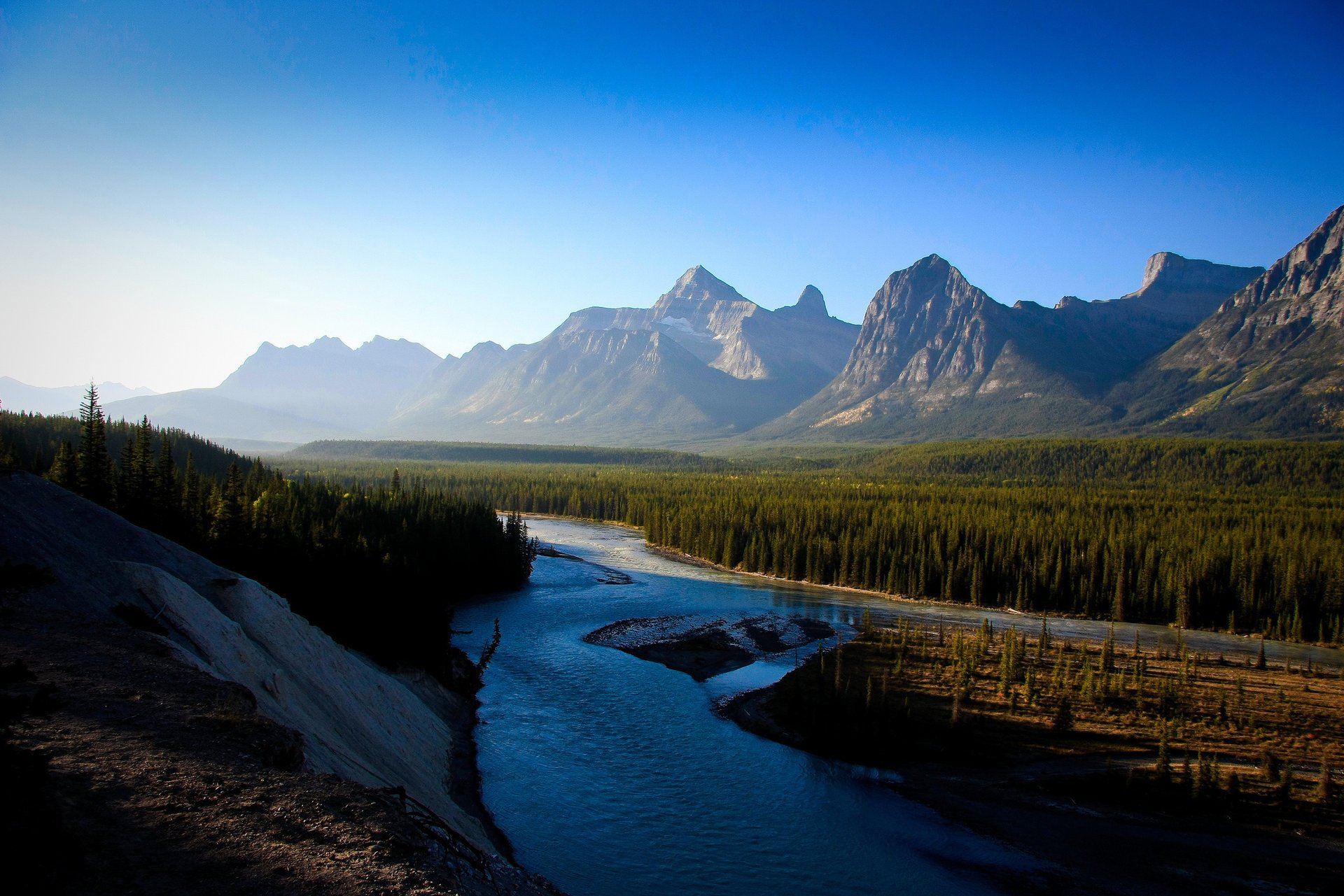 the slopes the sun forest landscape river the sky nature mountain