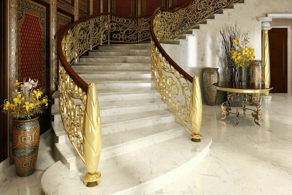 Interior staircase. Golden handrails