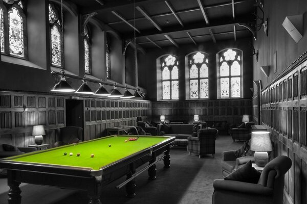 The interior of a game room with a billiard table