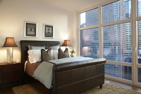 Stylish bedroom with a leather bed