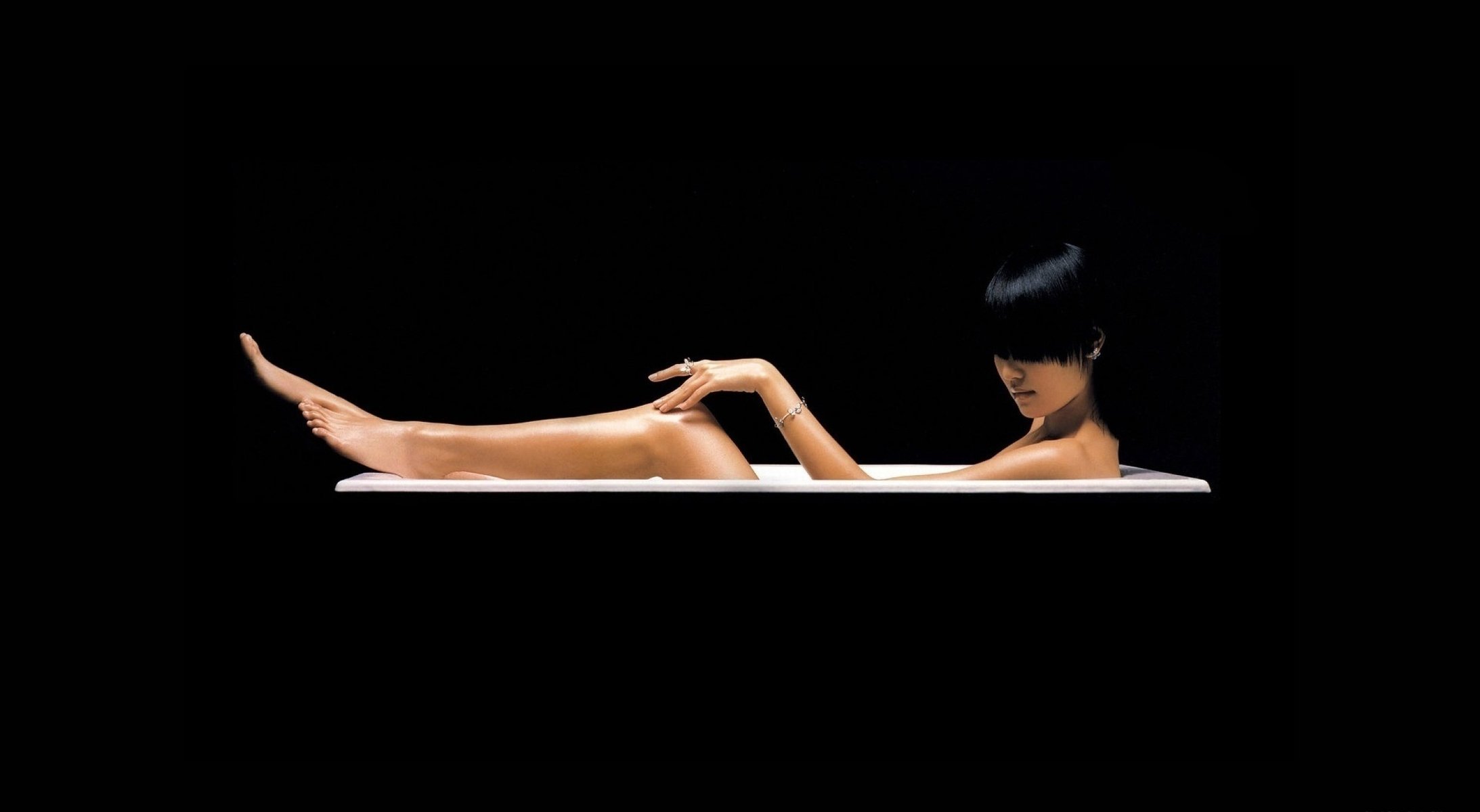 black background girl bath