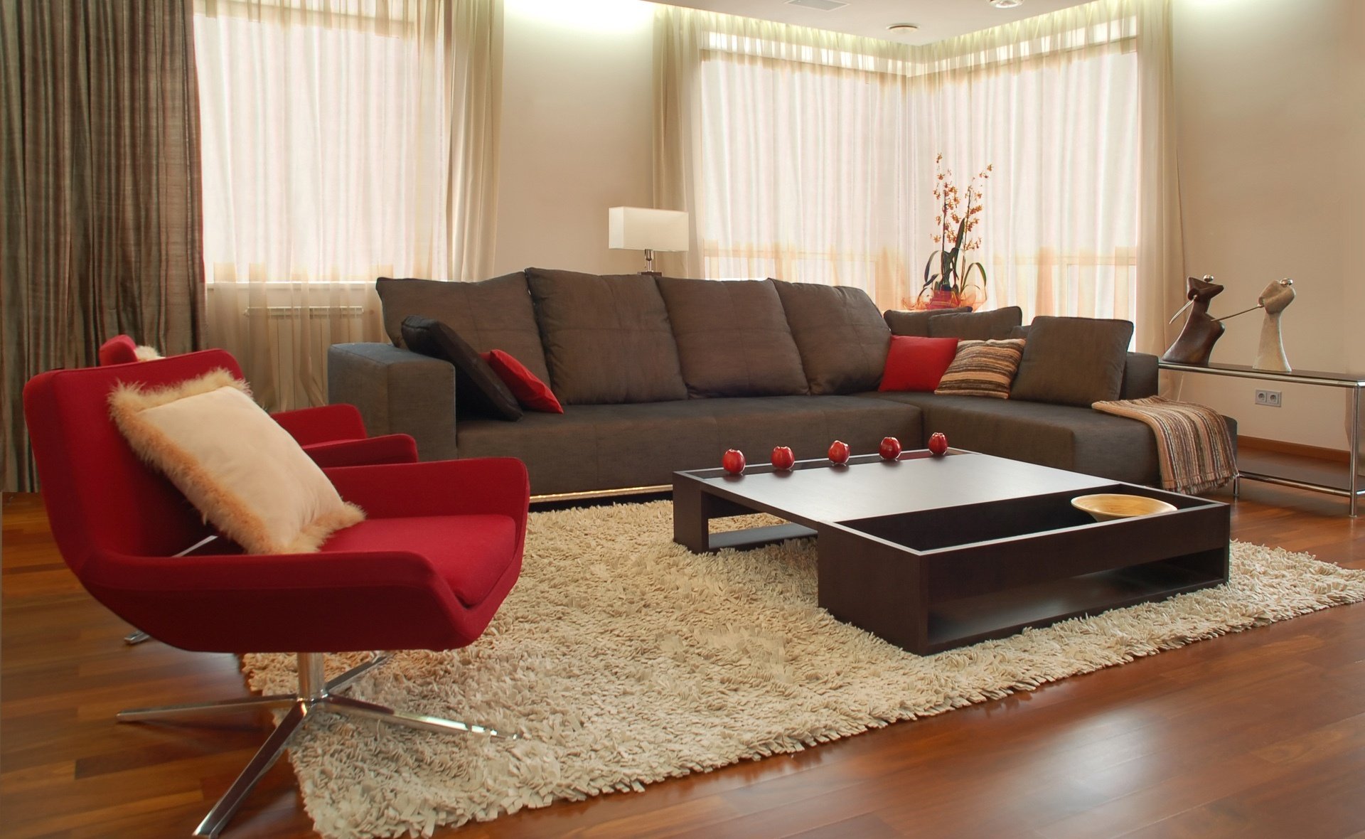 interior design style room furniture red chair brown sofa table apples carpet