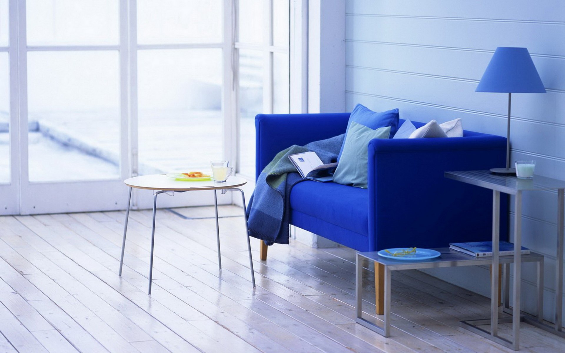 interior room apartment design style chair sofa blue cup mug milk dish pillow book food table light magazine window