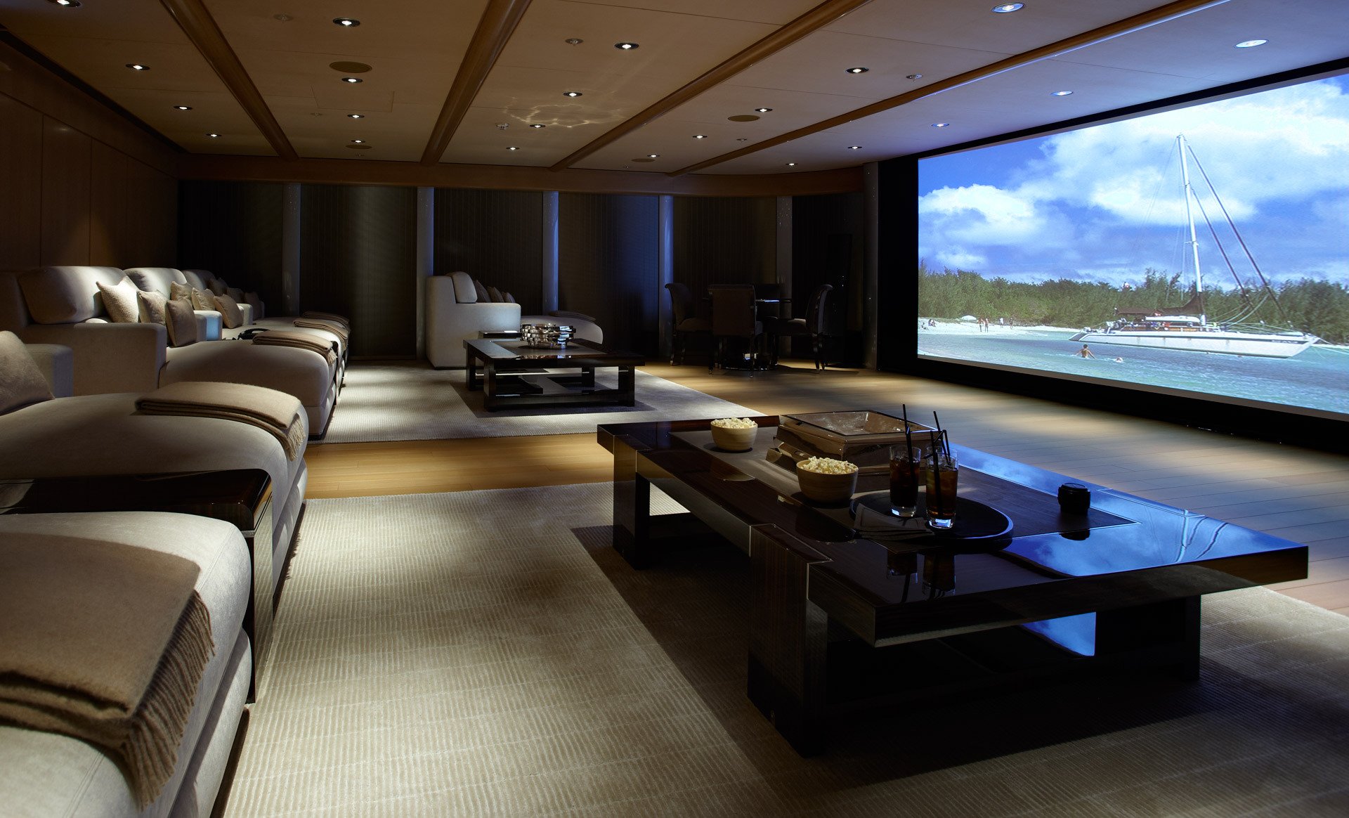 interior home a movie house sofas pillow tables light screen movie