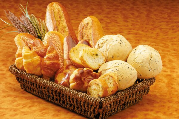 Basket with loaves , bread , buns