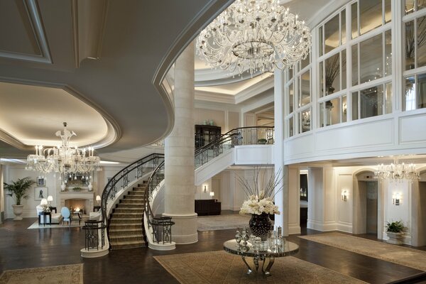 The ceremonial decoration of the staircase in the house with columns