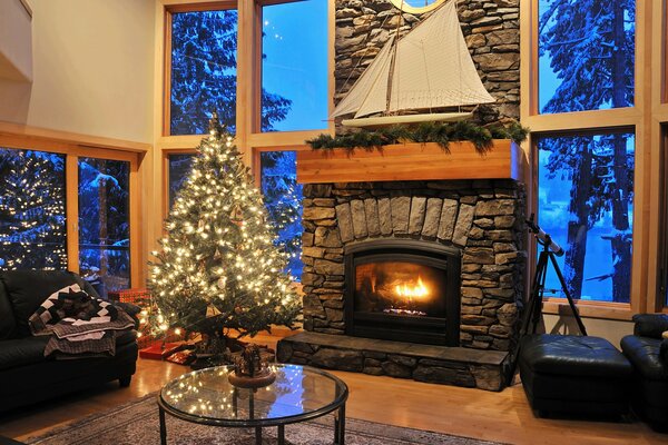 Christmas tree by the fireplace in the living room