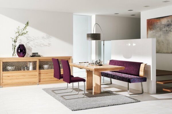 The interior of the room in purple tones and wood